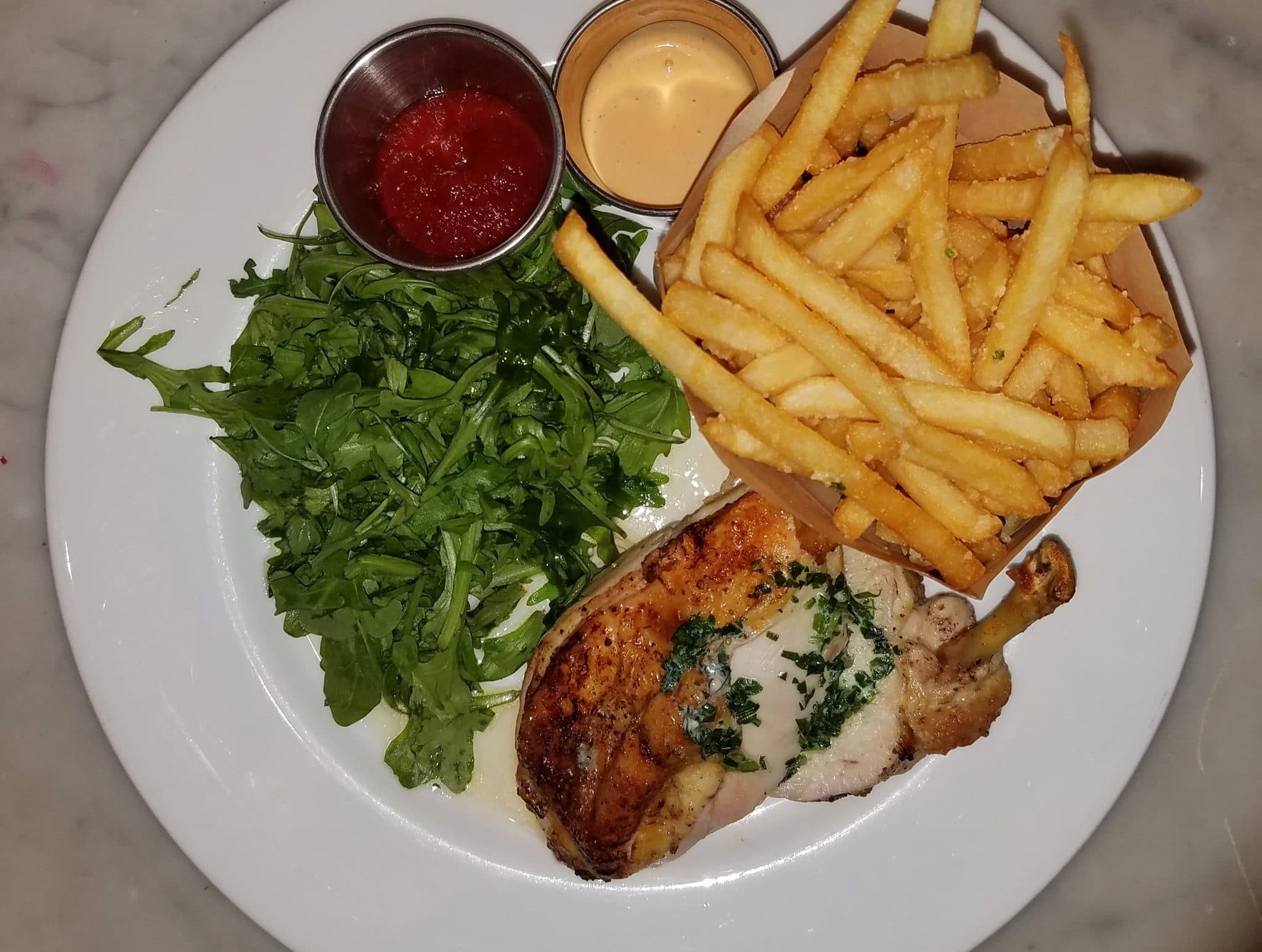 Roast chicken with fries and rocket salad